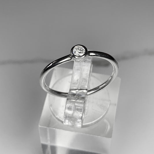 Solitaire Ring with 3mm, 0.10ct. Bezel set Diamond
