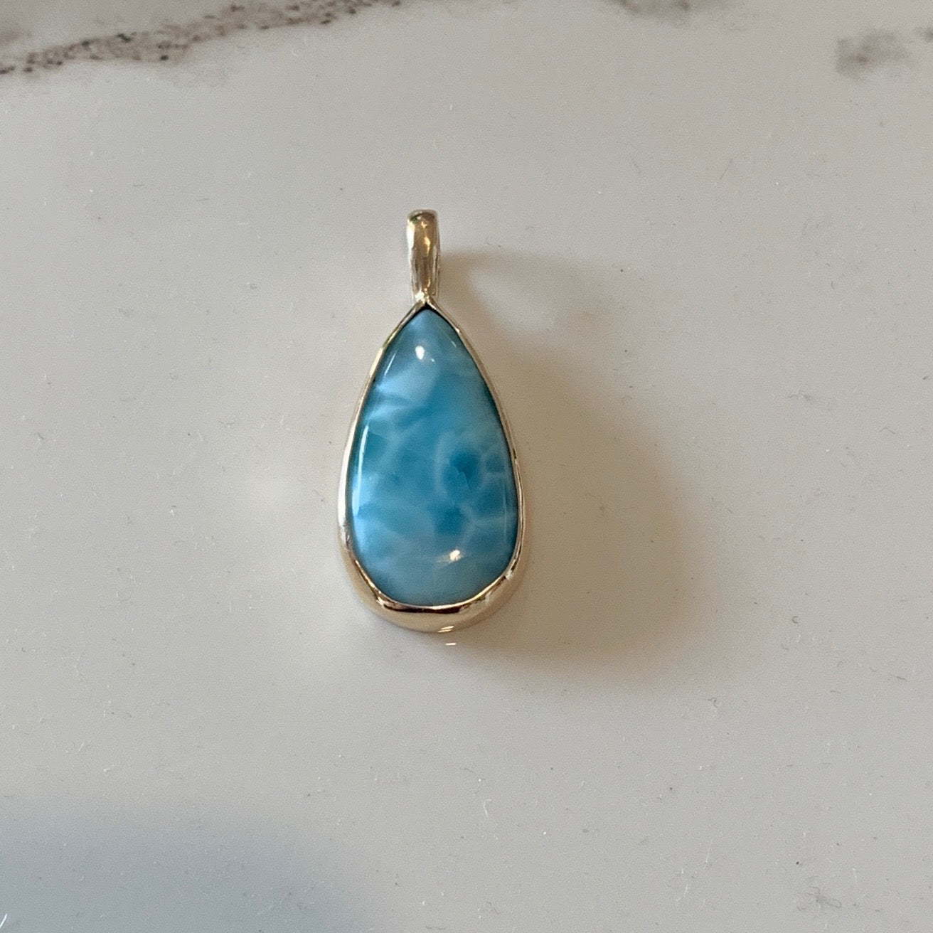 Larimar Pendant set in 9kt Yellow Gold