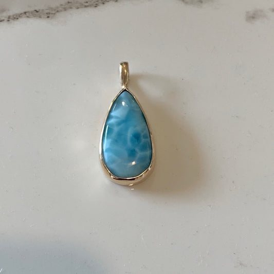 Larimar Pendant set in 9kt Yellow Gold