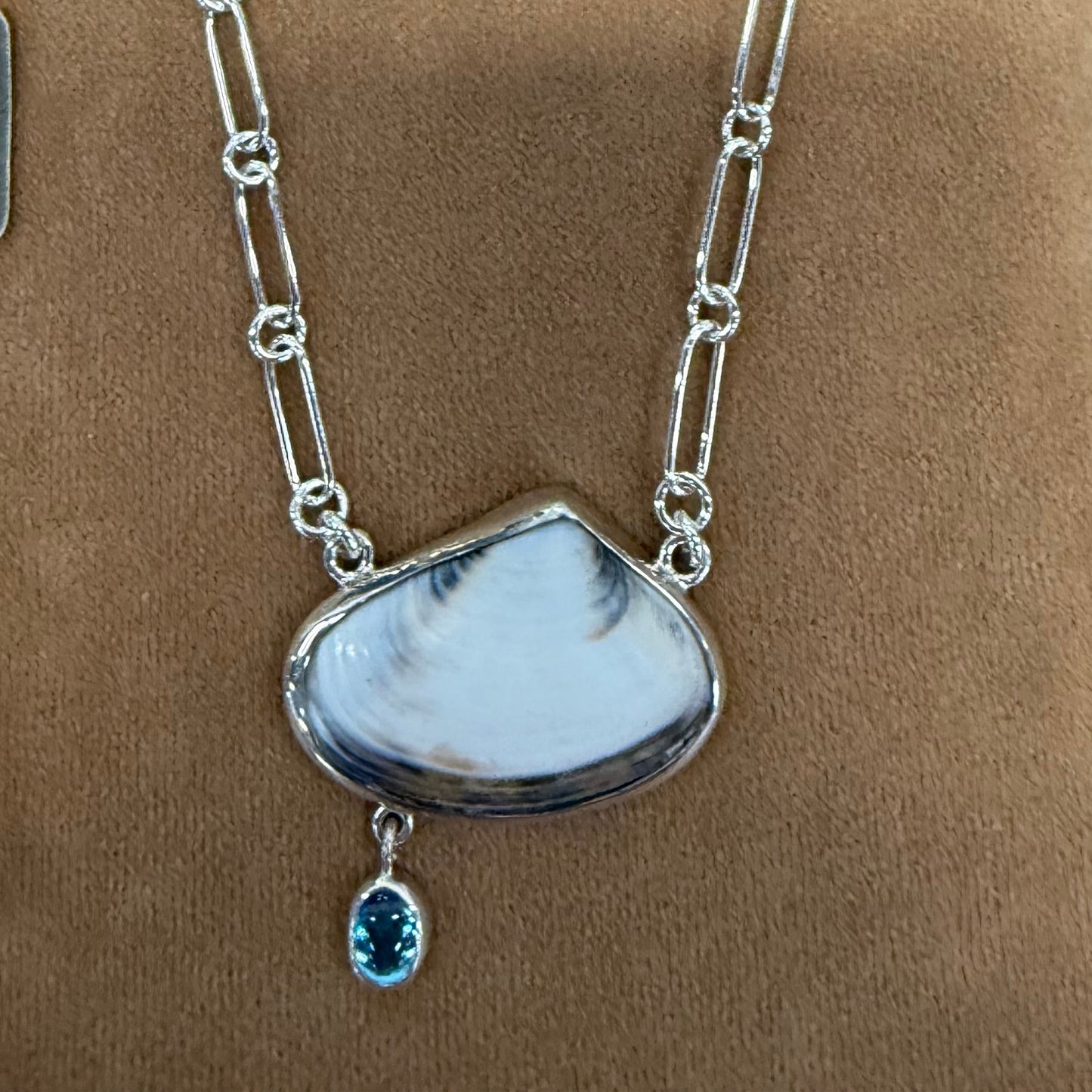 Shell Necklace set in SterlingSilver with Blue Topaz 