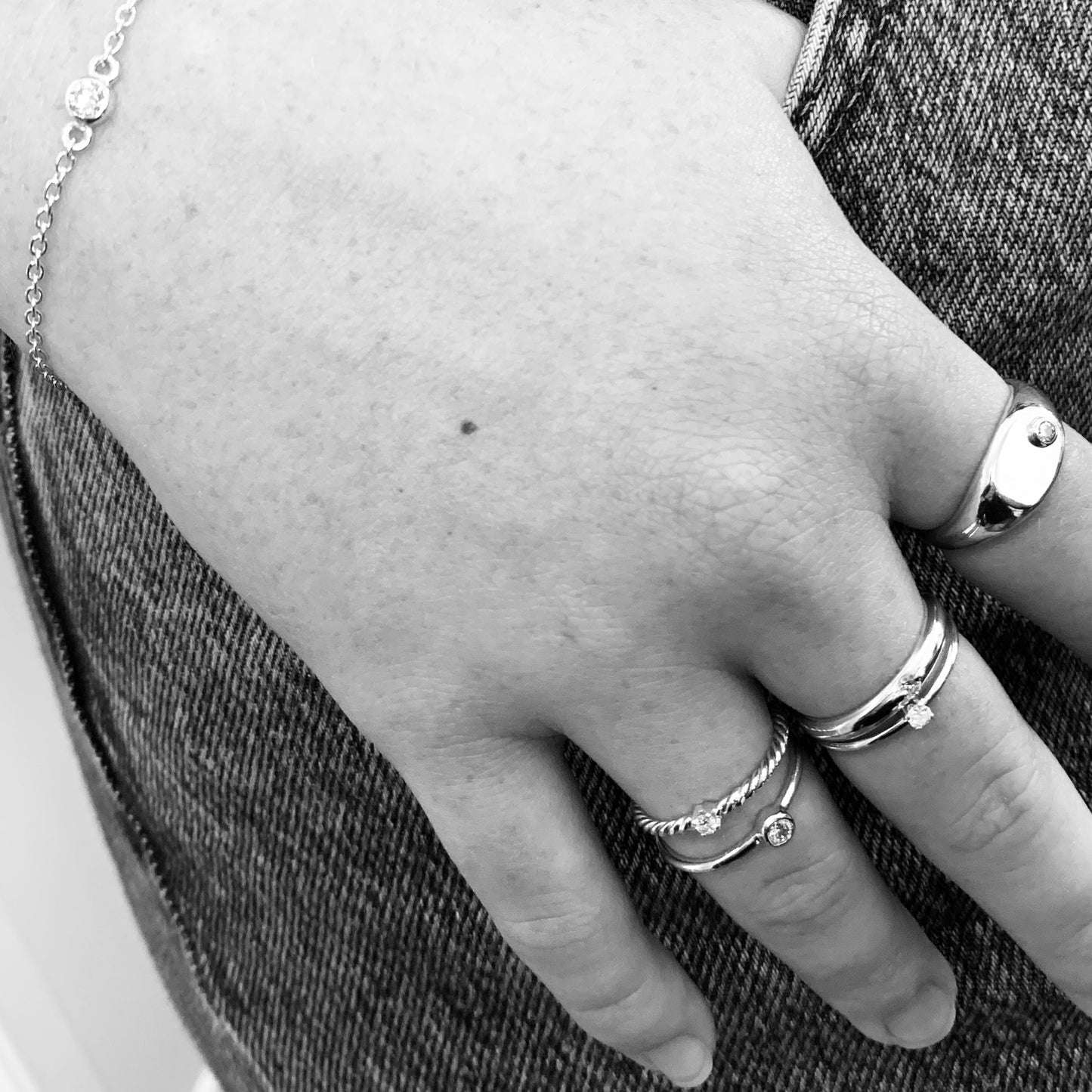 Solitaire Ring with 2.5mm, 0.06ct. Diamond on rope band