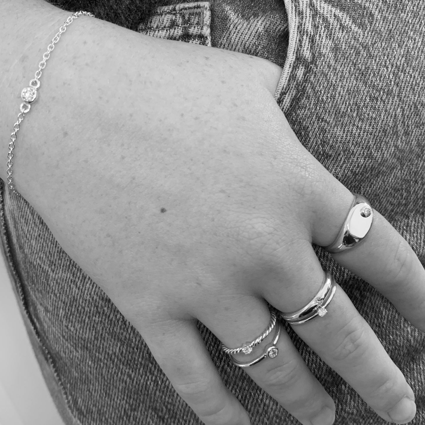 Signet Ring with 2.5mm, 0.06ct. Bezel set Diamond