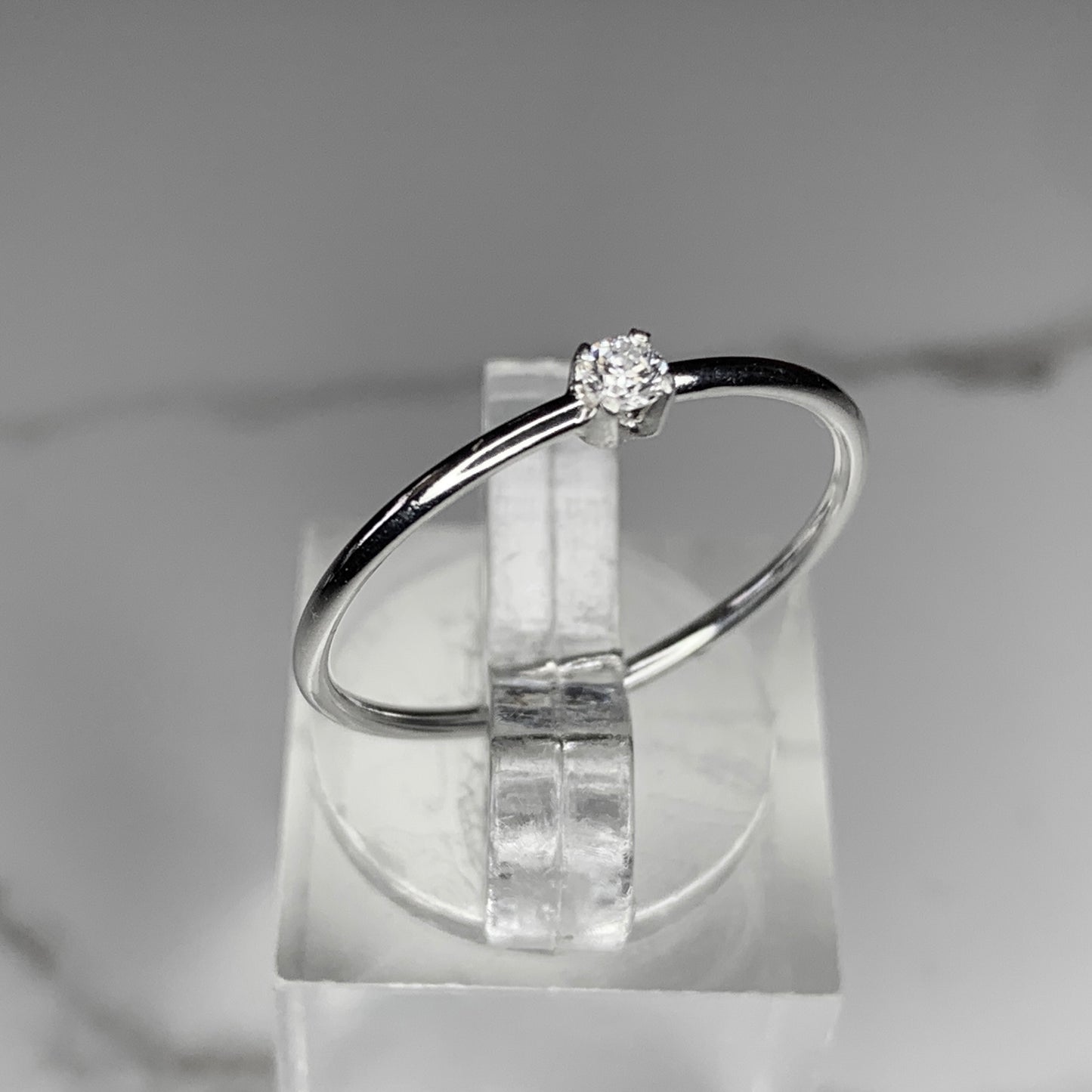 Solitaire Ring with 2.5mm, 0.06ct. Diamond on plain band