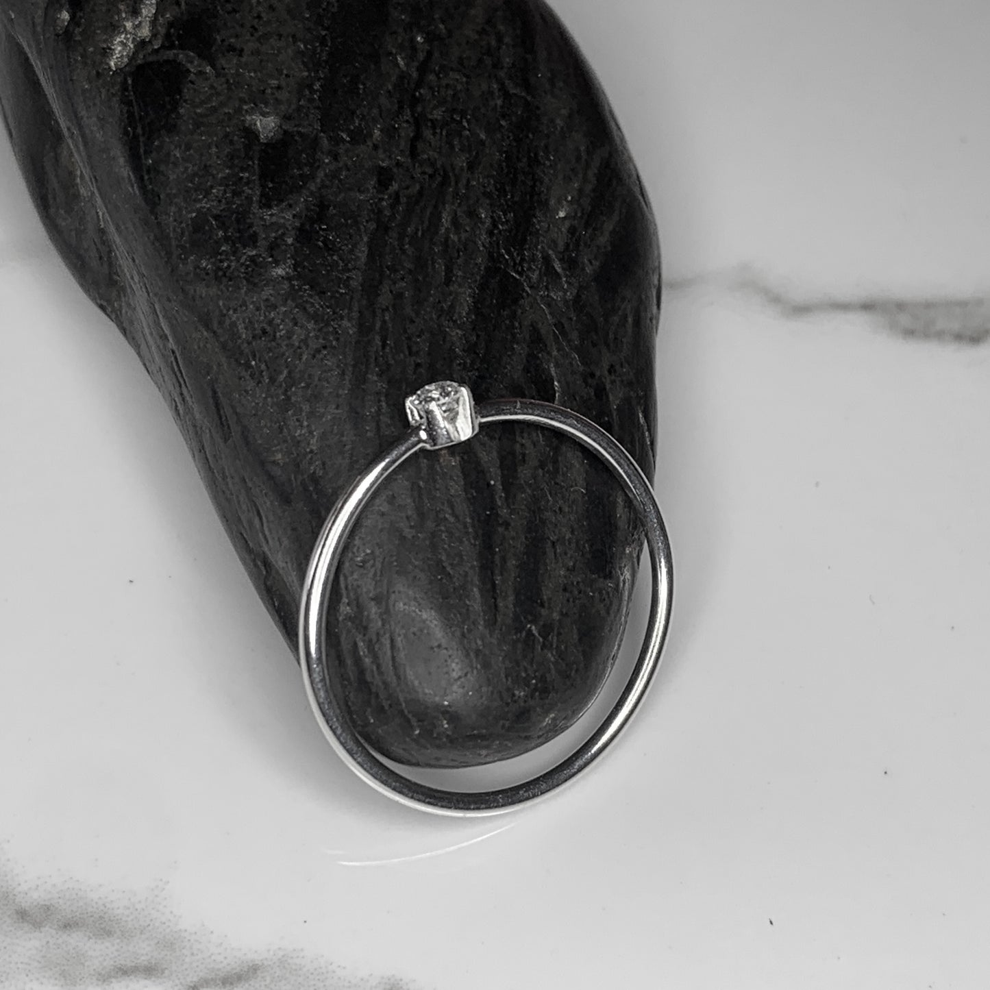 Solitaire Ring with 2.5mm, 0.06ct. Diamond on plain band