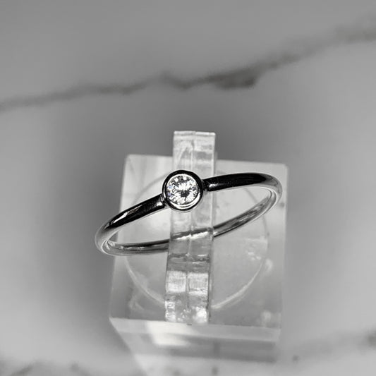 Solitaire Ring with 3mm, 0.10ct. Bezel set Diamond