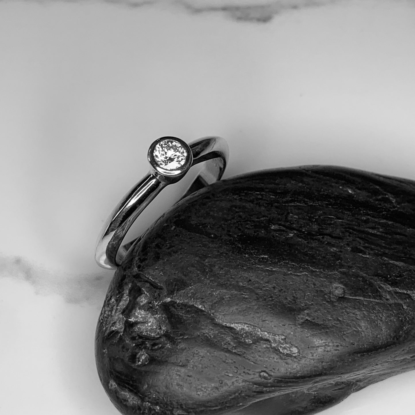 Solitaire Ring with 4mm, 0.25ct. Bezel set Diamond